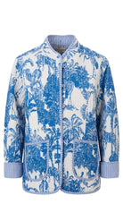Blue Jardin Jacket product flat shot on white background, full front view showing the blue and white toile print, stand collar, tie closures, and patch pockets with striped trim
